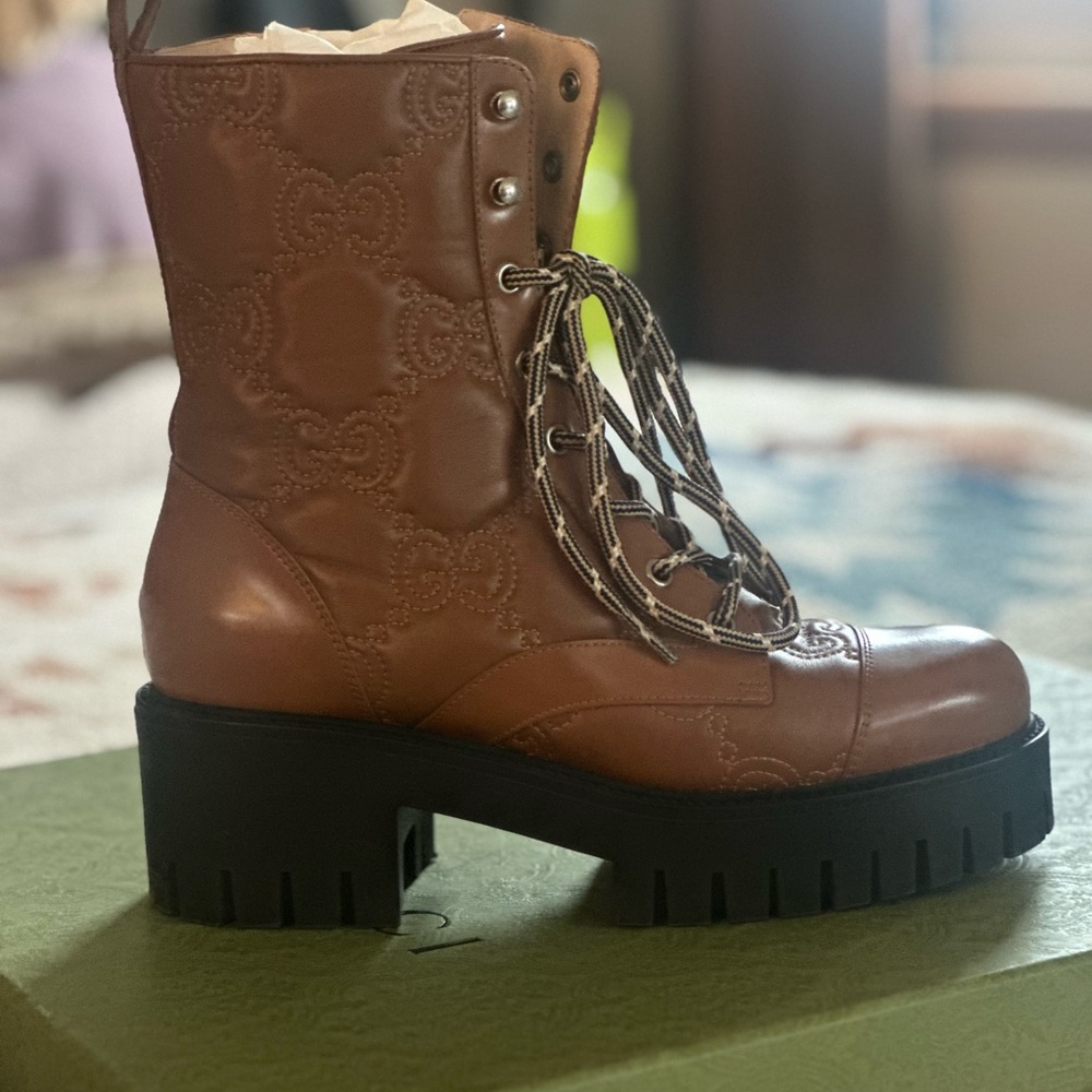 Gucci leather matelasse brown boots.